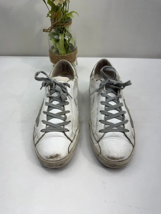 Golden Goose Deluxe Brand Super-Star sneakers in a white and silver colorway. - Picture 2 of 8